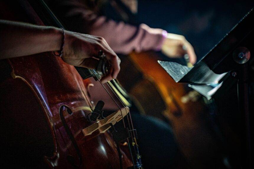 A close-up of a violin played by some people during a Candlelight event. There will be a musical event for Swifties in Toronto.