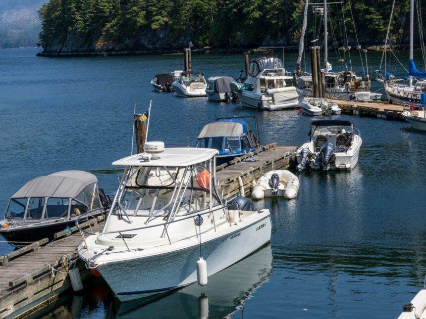 A white ferry at the port in Bowen Island.