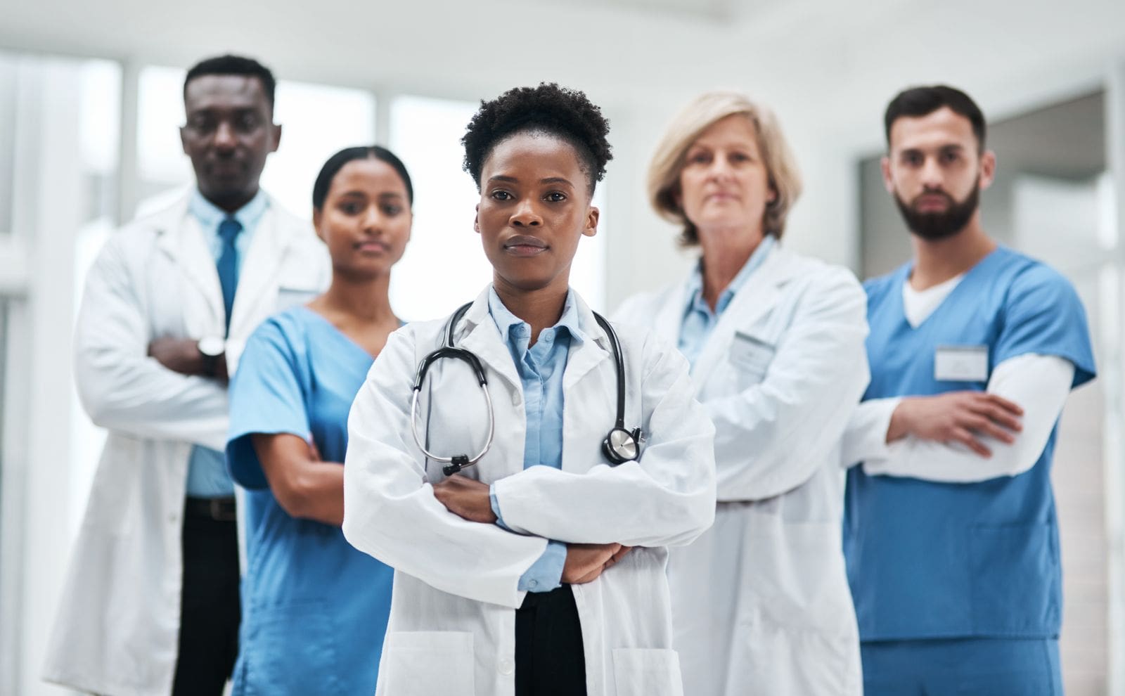 Various healthcare providers stand together to represent jobs in health career.