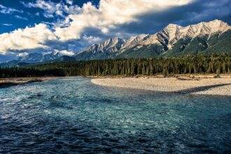 A river, mountains and cloudy sky in the Banff National Park