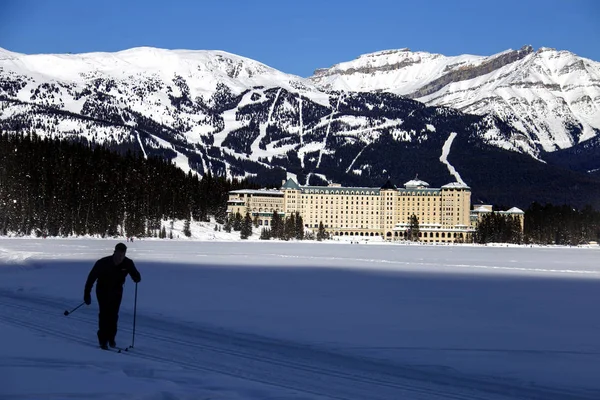 A silhouette of a person Skiing at Lake Louise Chateau