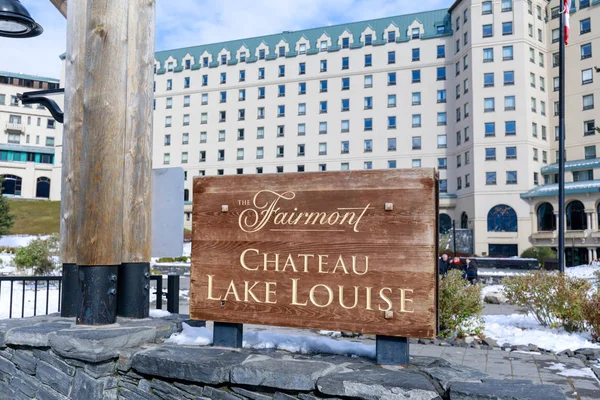 A wooden sign board of the Fairmont Chateau Lake Louise.