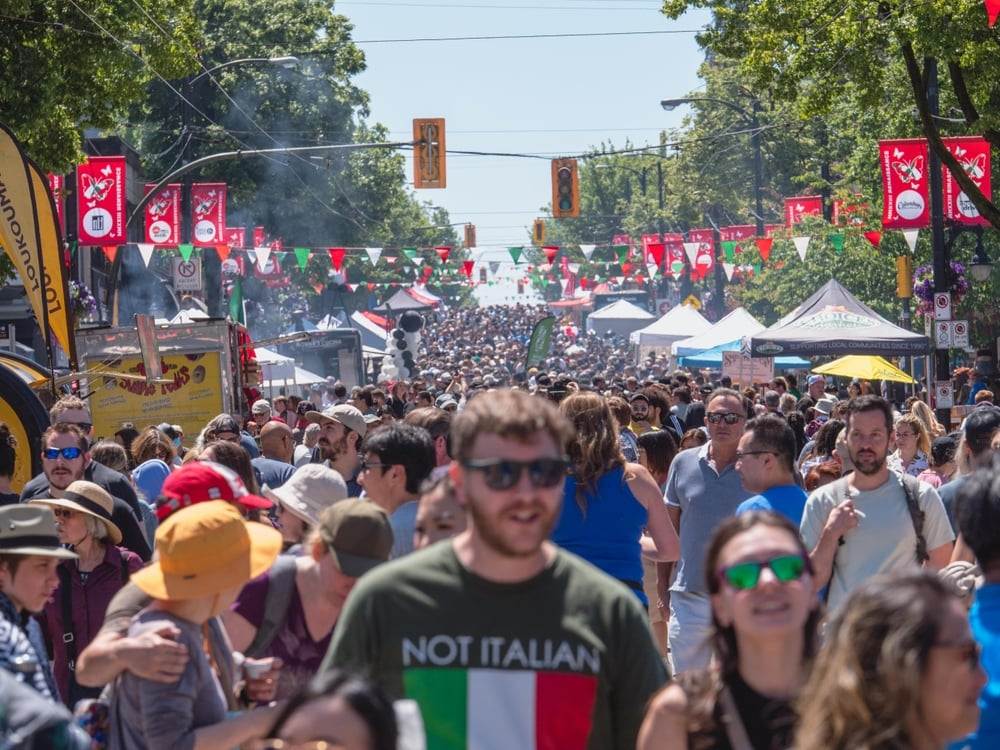 A huge crowd shopping in the Drive- Little Italy, Vancouver.