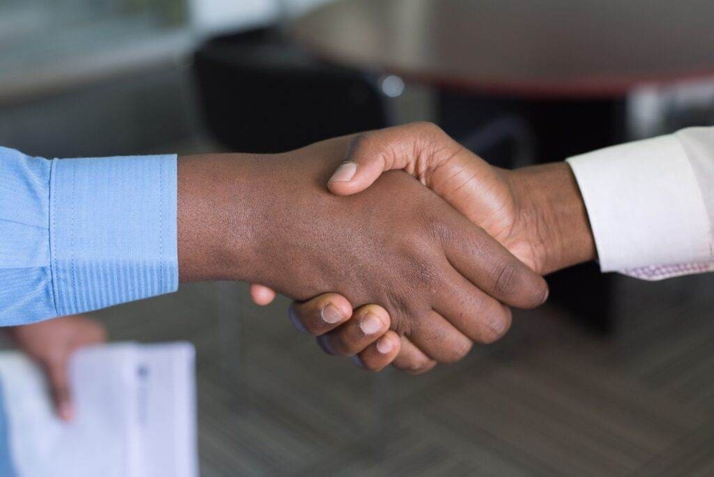 A close-up of a hand shake.