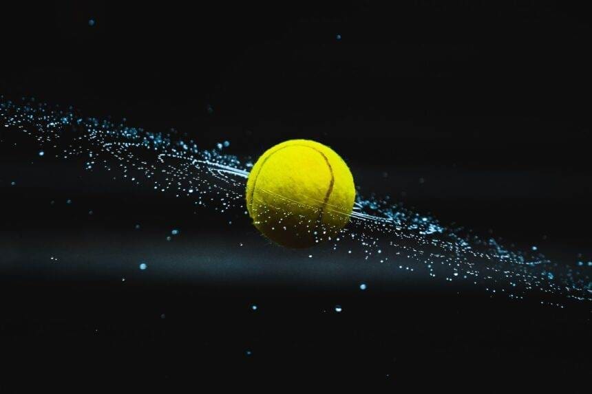 Tennis ball in water during night time