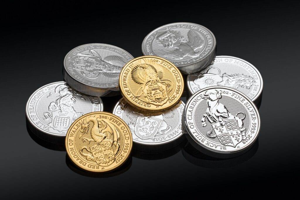 Coins scattered on a plain black background.