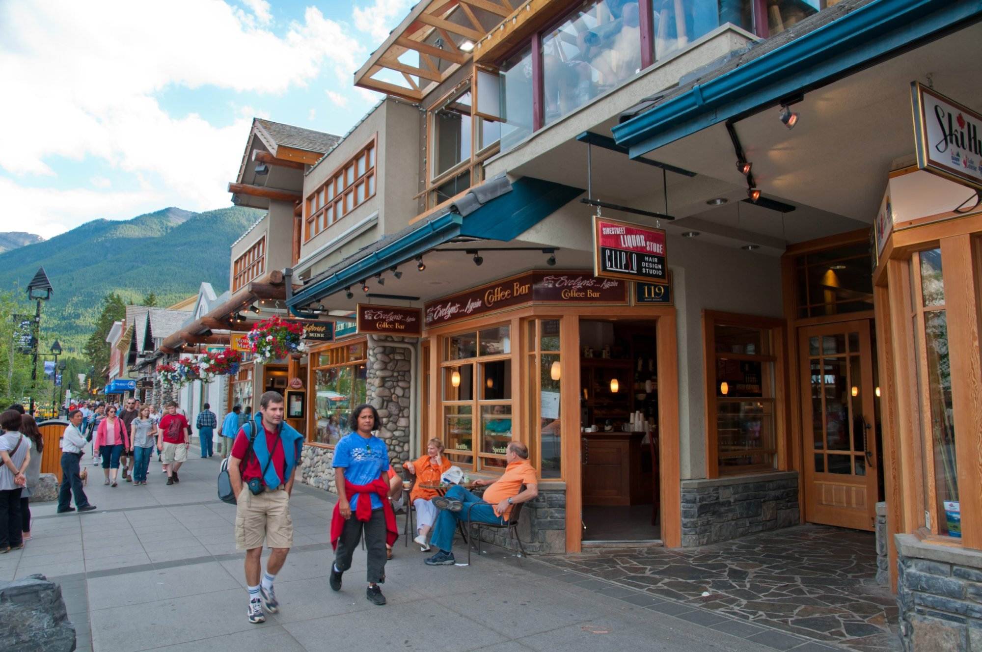 people walking on the street of the Banff Town, Banff Avenue.