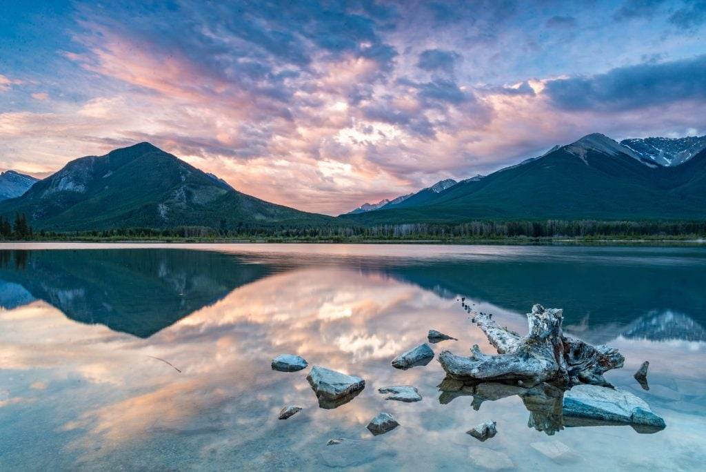 Mountains In Hamilton with cloudy sky and a waterbody.