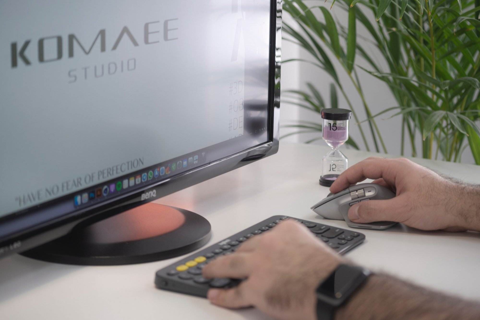 A close-up of a person working on a computer.