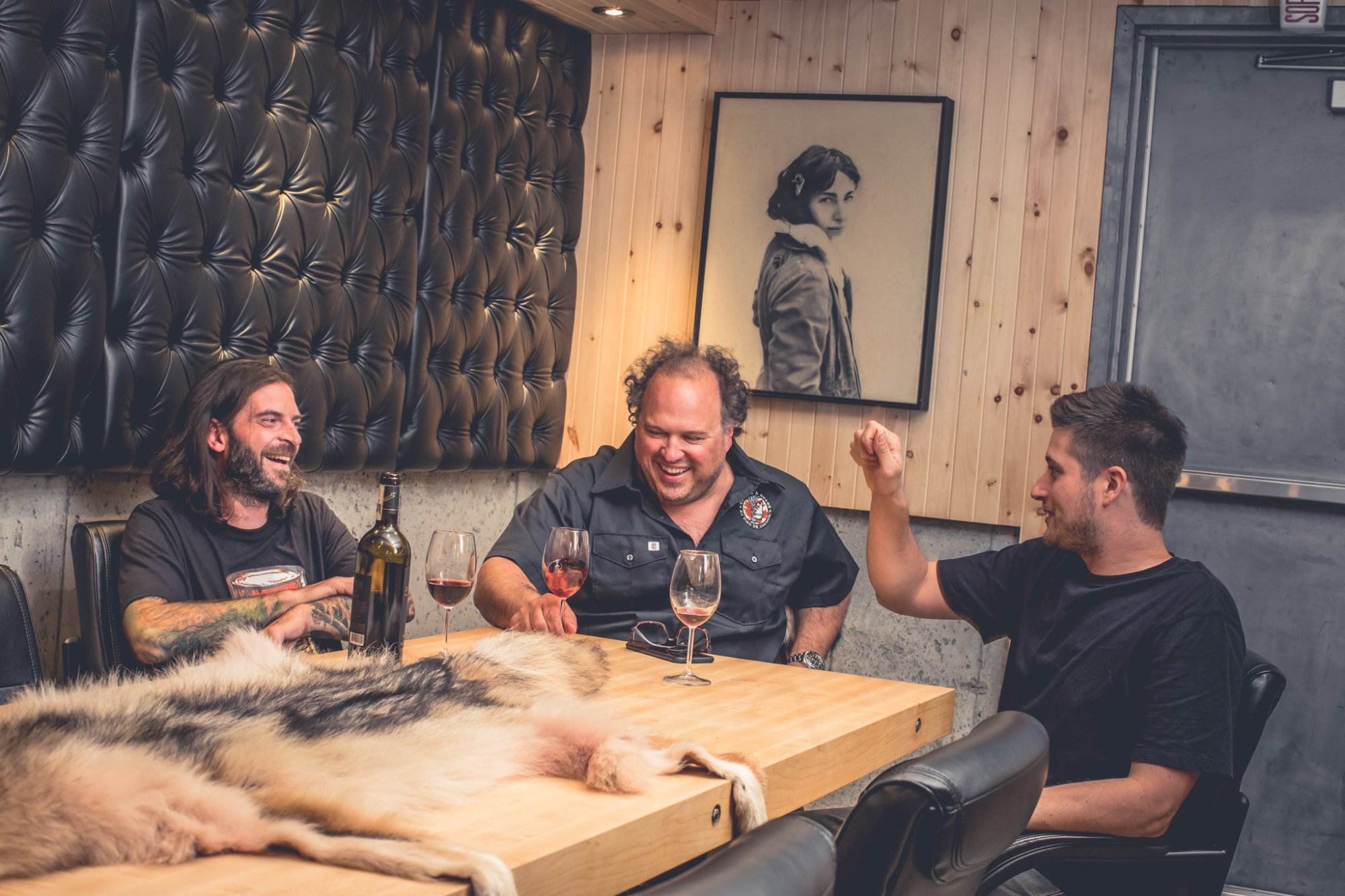 Three people sitting inside the restaurant 